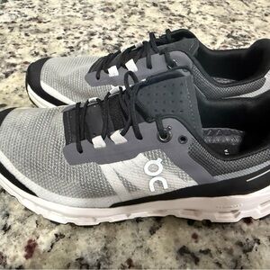 On Running Women's Gray and Black Treaded running shoes
